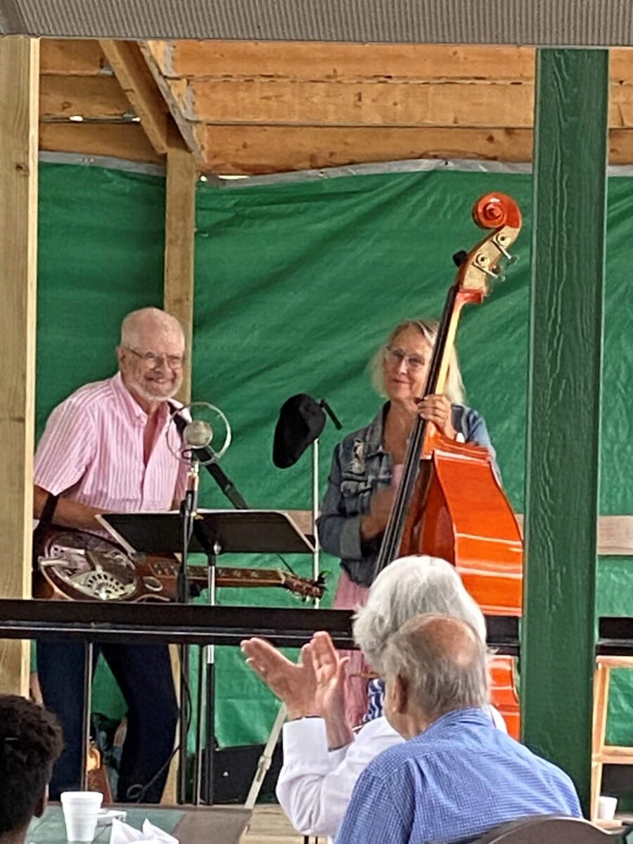A group of people playing instruments.
